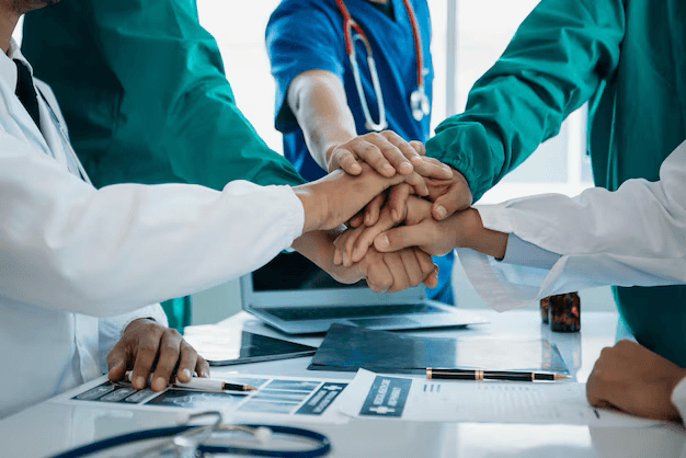 Doctor and patient shaking hands